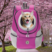 Chat dans sac rose Catpacky avec cerisiers en fleurs en arrière-plan